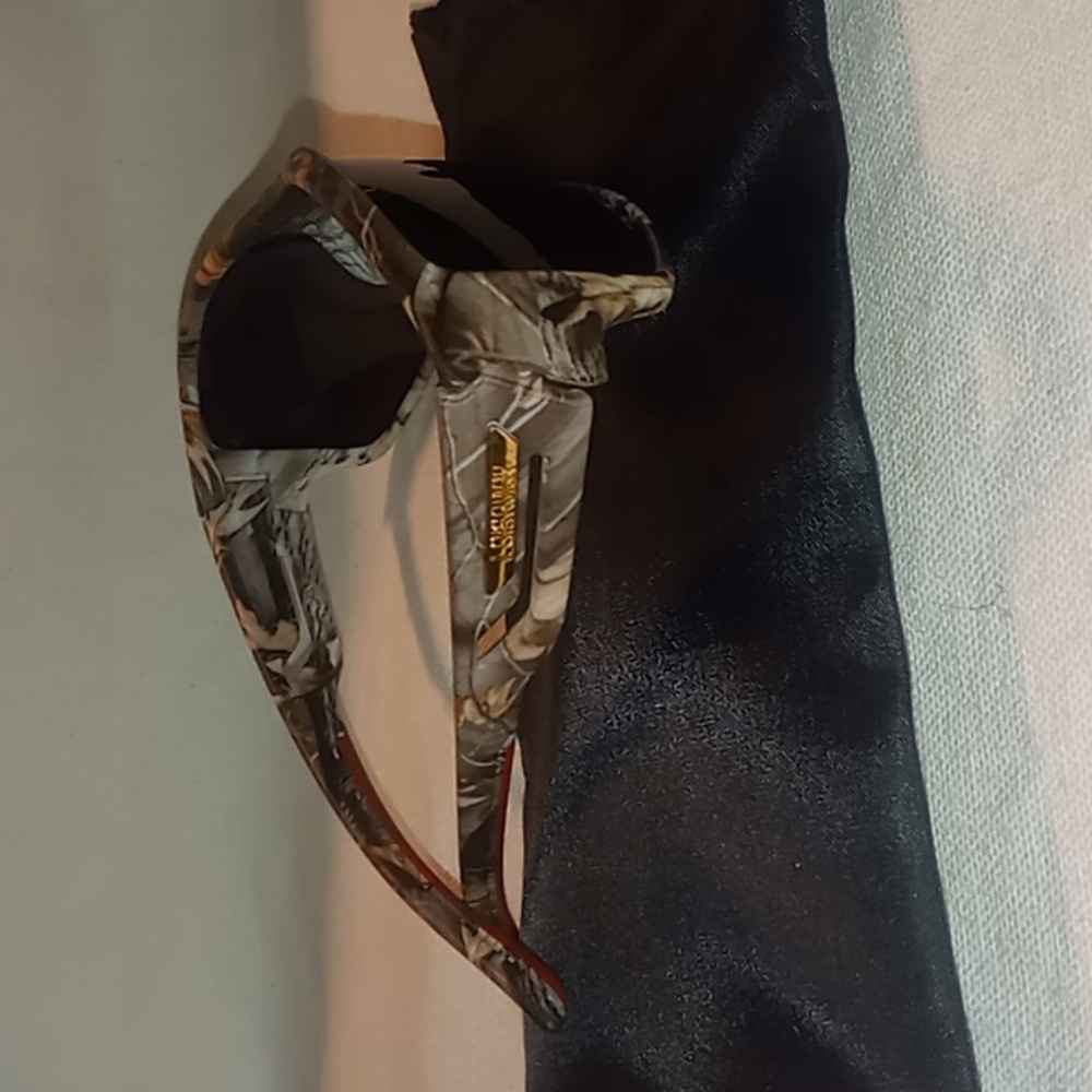 Mens camouflage blackened sun glasses with draw string bag .